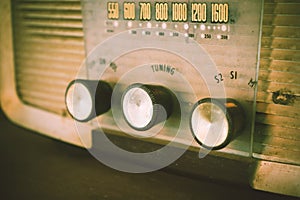 Old transistor radio analog dial button.