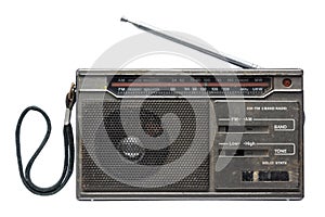 Old transistor radio isolated on white background.