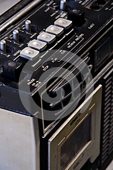 Old transistor radio on white background.