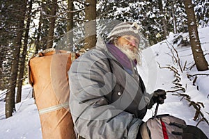 Old traveler in the mountains