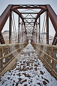 Old trestle footbridge in winter