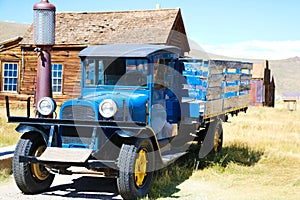 Old Truck on display. 1927 Dodge Graham near old gas pumps