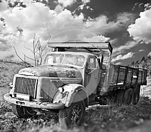Old truck on field
