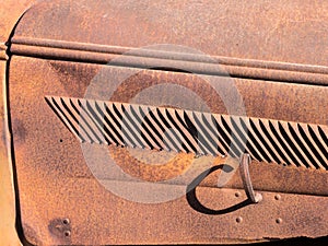 Old truck hood rusting away