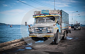 An old truck parked at the Saphan Pla Pier, Sriracha District, Thailand