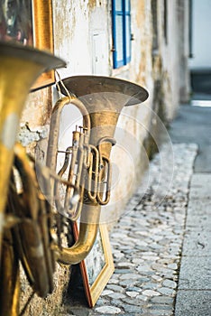 Old Tuba Hanging on a Medieval Building in Slovenia