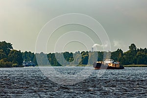 Old tug ship underway