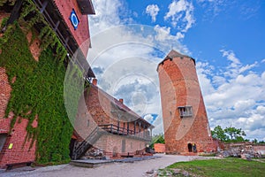 Old Turaida castle with tower in a sunny day. Summer landscape. Gauja national park, Sigulda, Latvia