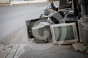 Old TV broke down littered on street.