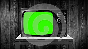 Old tv set with green screen, compositing, chroma key photo