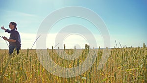 Old two farmers summer man Wheat Field running in the field wheat bread. slow motion video. farmer ecology concept