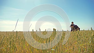 Old two farmers summer man Wheat Field running in the field wheat bread. slow motion video. farmer ecology concept