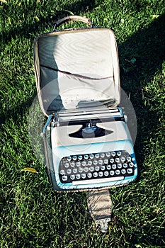 Old typewriter on the grass