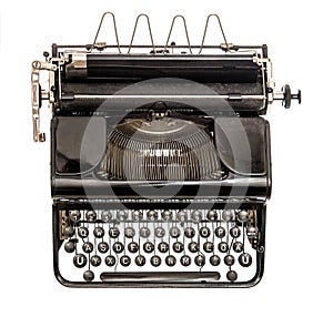 Old typewriter isolated on white background. Antique object