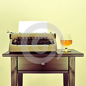 Old typewriter and liquor