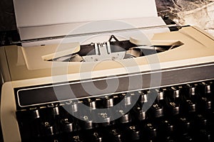Old typewriter with paper