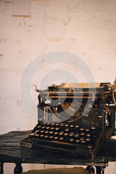 an old typewriter on the table. a gift for the writer.