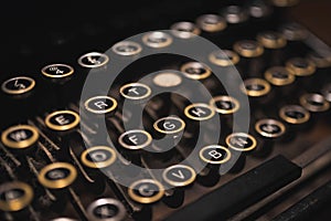 Old typewriter on a wooden table