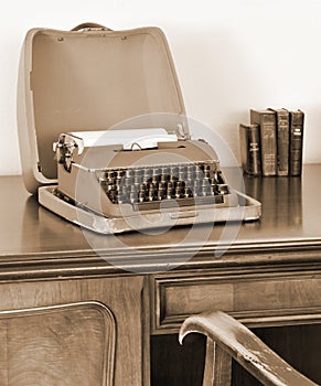 Old typewriter on writing desk