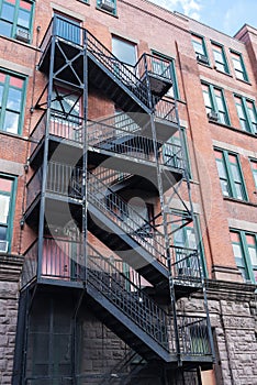 Old typical brick house in Chinatown, New York City, USA