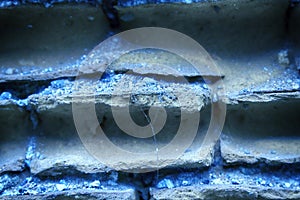 Old ultra blue brick wall, stone background or rock surface - good for web site or mobile devices