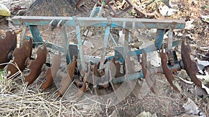 Old unused plow harrow