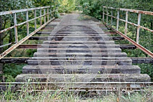 Old unused railway bridge. A small railway crossing over the riv
