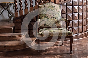 Old upholstered armchair