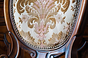 Old upholstered wood chair