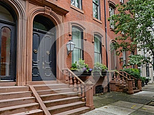 Old urban brownstone type townhouse with double door