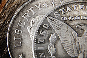 Old US coins as symbol: America - the land of opportunities and freedom. Selective focus on Liberty inscription