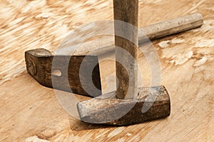 Old used hammer and adze