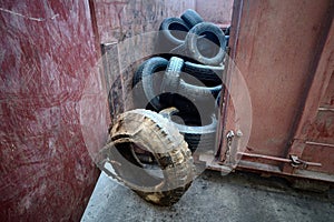 Old used obsolete car tires from trucks and passenger cars store