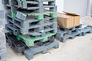 Old used pallets stacking together