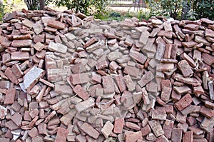 Old used red bricks stack in India