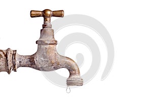 Old and used Vintage faucet with water drop