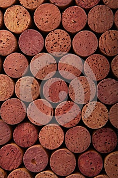Old used wine corks of red wine, close-up. Wine cork stoppers. Design element, background or screensaver for menu