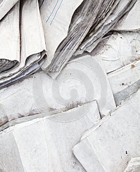 Old useless paper documents on the landfill