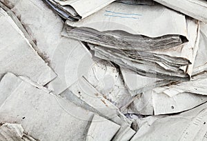 Old useless paper documents on the landfill