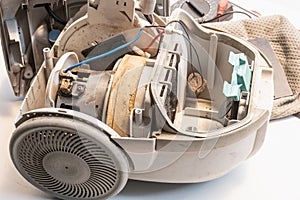 Old vacuum cleaner is broken , Defective vacuum motor and dirty photo