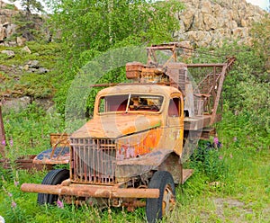 An old vehicle left to rust at an outdoor museum in yellowknife