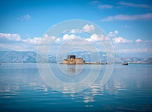 The old Venetian fortress and old prison, Bourtzi at the sea. Argolis bay, Nafplio - Greece