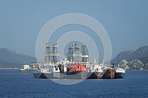 Old vessels side by side at anchorage