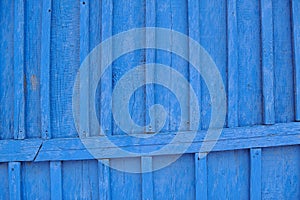 Old vibrant blue painted wooden background photo