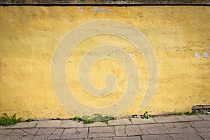 Old vibrant yellow wall