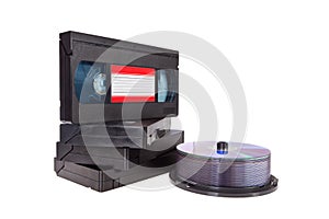 Old Video Cassette tapes with a DVD disc isolated