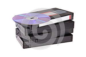 Old Video Cassette tapes with DVD discs photo