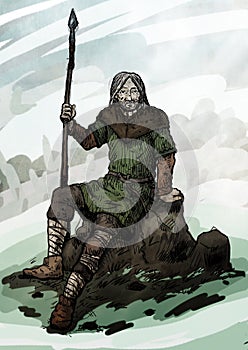 Old viking sitting on a rock photo