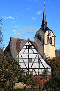 Old village church with half-timbered house in Unterregenbach Germany
