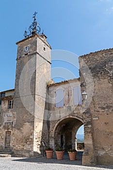 Old village of the Provence Town hall MÃÂ©nerbes on a hill department Vaucluse in Luberon mountains Provence